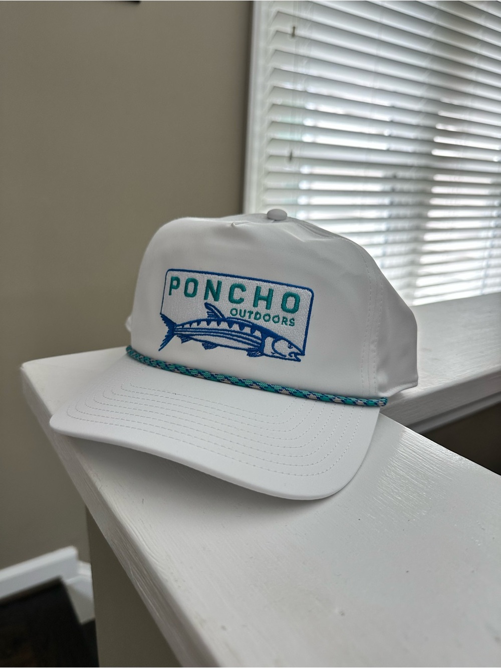 Poncho Outdoors White Fishing Logo Rope-Trim Trucker Hat